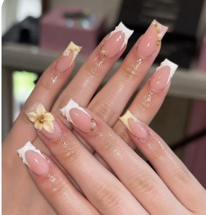 Cream French coffin nails with 3D yellow flowers and gold beads