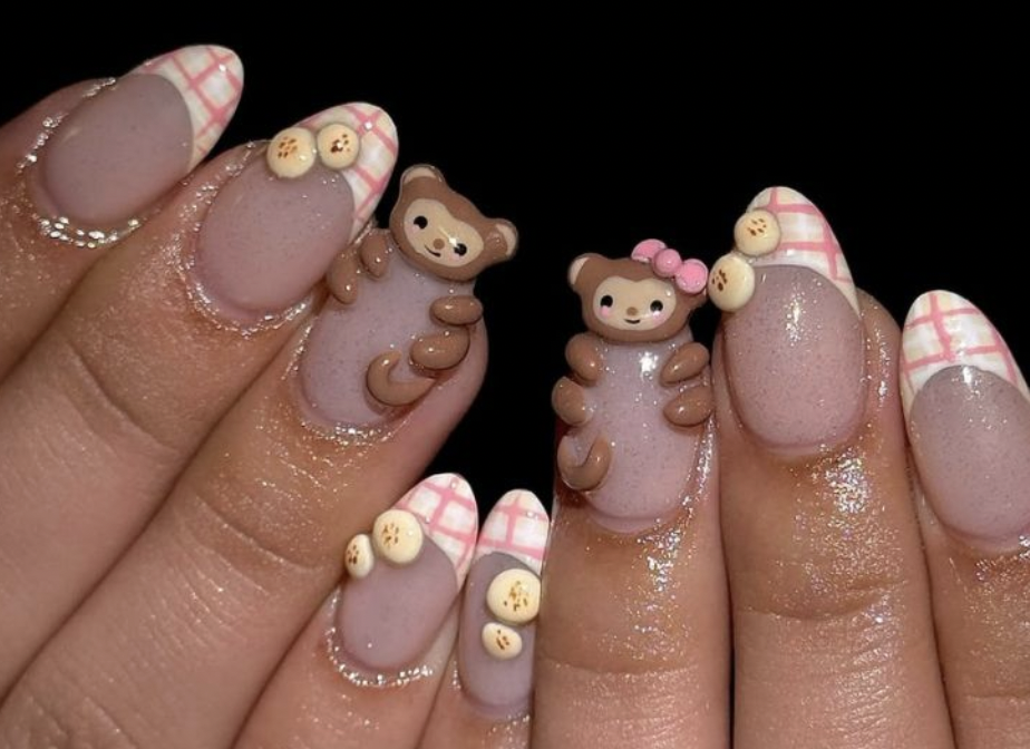 Almond nails with teddy bear charms and pink plaid tips