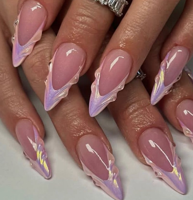 Frosted lavender stiletto nails with iridescent ruffle tips
