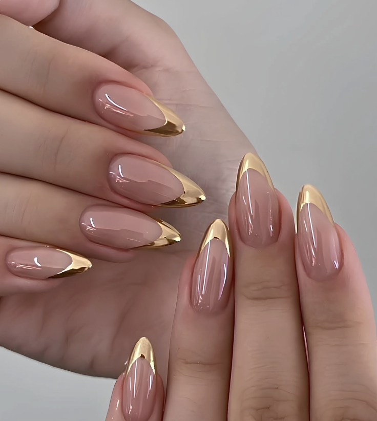 Glossy gold chrome French almond nails