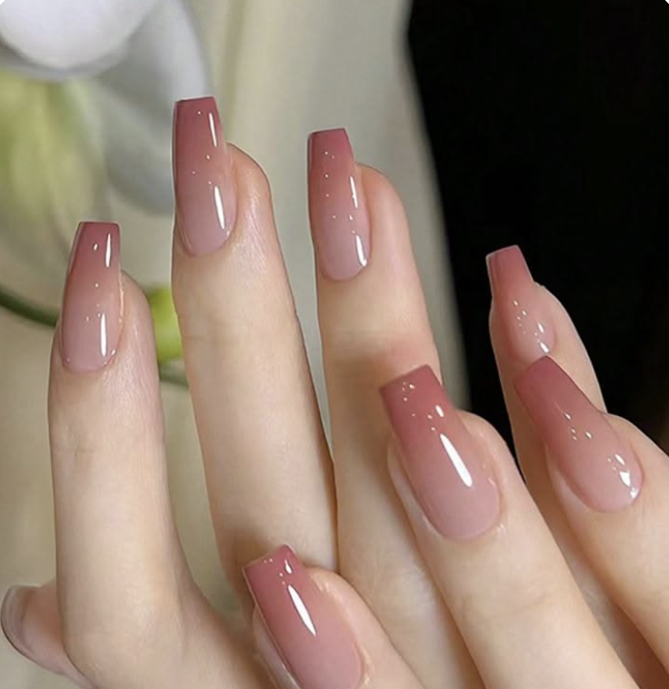 Pink coffin nails with tiny dot details