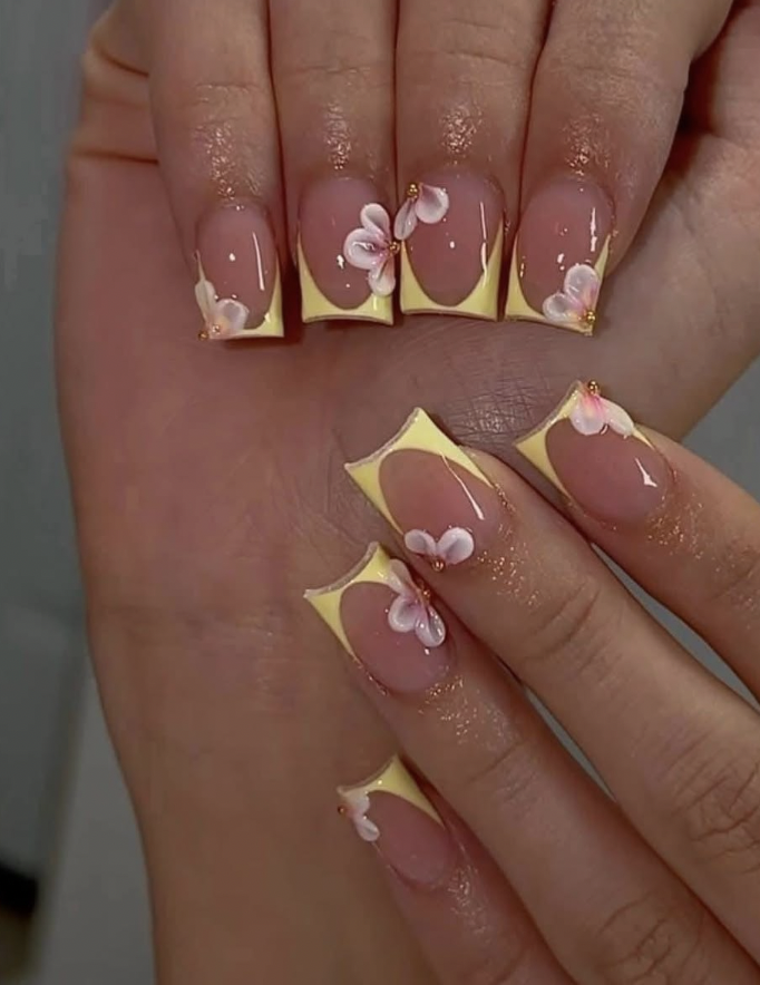 Yellow French coffin nails with 3D butterflies