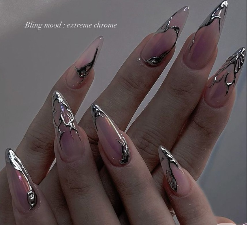 Extreme silver chrome stiletto nails