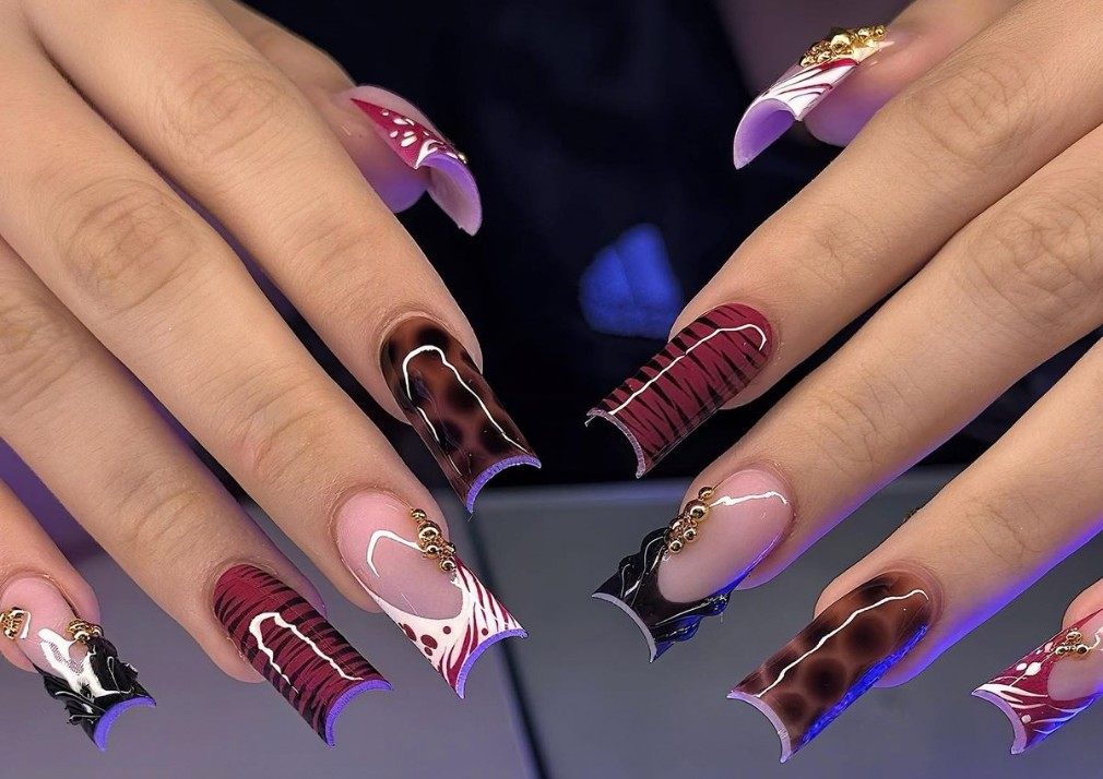 Long flared duck nails with tortoise and zebra prints